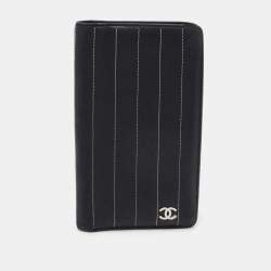 Pre Owned Chanel Black Striped Leather Vertical CC Wallet