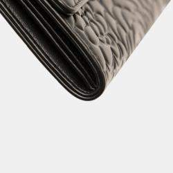Pre Owned Chanel Black CC Lambskin Embossed Camellia Flap Wallet