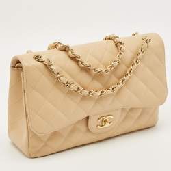 مملوكة مسبقًا حقيبة شانيل ذات قلاب مزدوج كلاسيكي جلد مبلوط بيج كبير الحجم