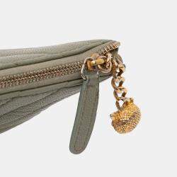 Pre Owned Chanel Green Medium Chevron Caviar Ancient Greek Charms O Case Clutch