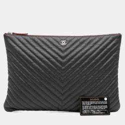 Pre Owned Chanel Black Large CC Chevron Caviar O Case Clutch