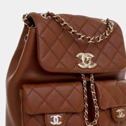 Pre Owned Chanel Brown Small Quilted Calfskin Duma Pockets Drawstring Backpack