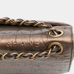 Pre Owned Chanel Brown Paris Dallas Metallic Calfskin Embossed Logo Flap
