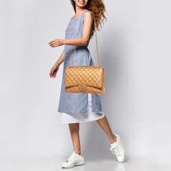 Pre Owned Chanel Metallic Brown Quilted Caviar Leather Maxi Classic Double Flap Bag