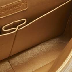 Pre Owned Chanel Metallic Brown Quilted Caviar Leather Maxi Classic Double Flap Bag