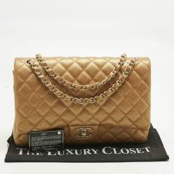 Pre Owned Chanel Metallic Brown Quilted Caviar Leather Maxi Classic Double Flap Bag