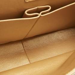 Pre Owned Chanel Metallic Brown Quilted Caviar Leather Maxi Classic Double Flap Bag