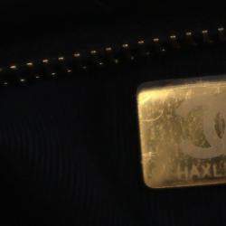 مملوكة مسبقًا حقيبة شانيل صغيرة من جلد العجل اللامع مع فيونكة