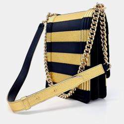 مملوكة مسبقًا Chanel Gold Navy Blue Leather Boy Flap Bag