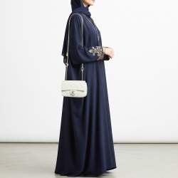 مملوكة مسبقًا حقيبة شانيل ميني كلاسيك جلد شيفرون أحمر لامع بقلاب