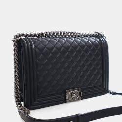 مملوكة مسبقًا حقيبة شانيل متوسطة جلد خروف بوي