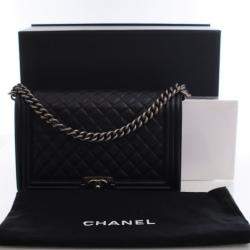 مملوكة مسبقًا حقيبة شانيل متوسطة جلد خروف بوي