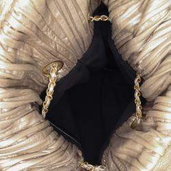 مملوكة مسبقًا حقيبة ظهر شانيل برباط كوكو ثنيات جلد عجل معدني ذهبي متوسط