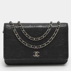 مملوكة مسبقًا Chanel WOC Black Camellia Embossed Leather Clutch Bag