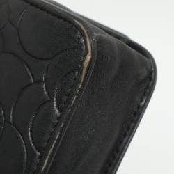مملوكة مسبقًا Chanel WOC Black Camellia Embossed Leather Clutch Bag