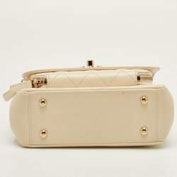 Pre Owned حقيبة شانيل بيزنس أفينيتي كافيار كريم صغيرة بغطاء جلدي