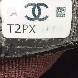 مملوكة مسبقًا حقيبة كلاتش شانيل أو كيس جلد كافيار مبطن كبير سواد بسحاب