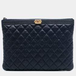 Pre Owned Chanel Blue Medium Quilted Caviar Boy O Case Clutch