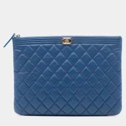 Pre Owned Chanel Blue Medium Quilted Caviar Boy O Case Clutch
