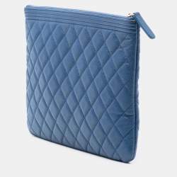 Pre Owned Chanel Blue Medium Quilted Caviar Boy O Case Clutch