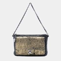 مملوكة مسبقًا حقيبة شانيل سهرة ليلية معدنية ذهبية مبطنة جلد الحمل بسلسلة