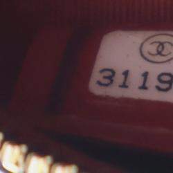 Pre Owned Chanel Round Pearl Chain Mini Lambskin Leather Clutch Bag