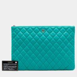 Pre Owned Chanel Blue Large Quilted Caviar O Case Clutch