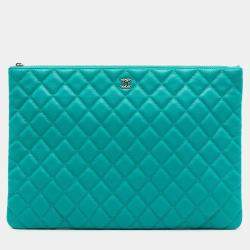 Pre Owned Chanel Blue Large Quilted Caviar O Case Clutch