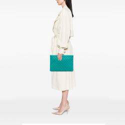 Pre Owned Chanel Blue Large Quilted Caviar O Case Clutch