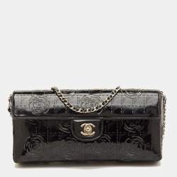 مملوكة مسبقًا حقيبة قلاب شانيل كامليا جلد براءات اختراع أسود ليزر شرق غرب