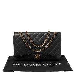 Pre Owned Chanel Black Quilted Caviar Leather Maxi Classic Single Flap Bag