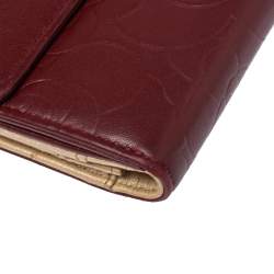 Chanel Burgundy Camellia Embossed Leather Flap Wallet