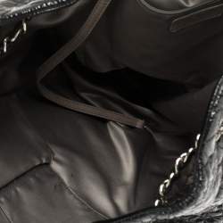 Pre Owned Chanel Black Camellia Quilted Vinyl Rock In Moscow Hobo