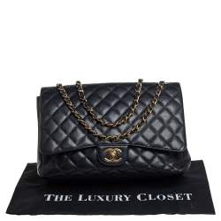 مملوكة مسبقًا Chanel Black Quilted Caviar Leather Maxi Classic Double Flap Bag