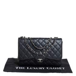 Pre Owned حقيبة شانيل جومبو كلاسيك جلد كافيار مبطن أسود ذات قلاب واحد 