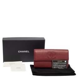 Pre Owned محفظة كونتينينتال شانيل جلد أحمر داكن قلاب مزين سي سي 