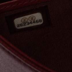 Pre Owned محفظة كونتينينتال شانيل جلد أحمر داكن قلاب مزين سي سي 