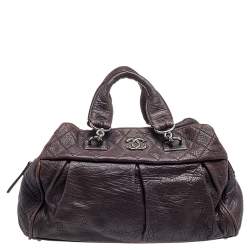 مملوكة مسبقًا حقيبة شانيل دكتزر جلد بنفسجي بطيات