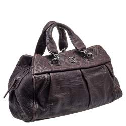 مملوكة مسبقًا حقيبة شانيل دكتزر جلد بنفسجي بطيات