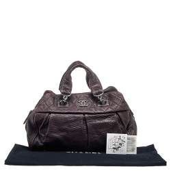 مملوكة مسبقًا حقيبة شانيل دكتزر جلد بنفسجي بطيات