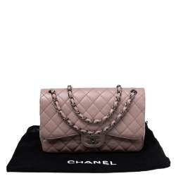 مملوكة مسبقًا حقيبة شانيل كلاسيك جامبو جلد كافيار مبطن أسود بقلاب مزدوج 