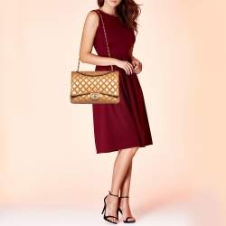 Pre Owned Chanel Metallic Beige Quilted Leather Maxi Classic Single Flap Bag