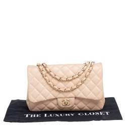 مملوكة مسبقًا حقيبة شانيل جامبو كلاسيك جلد مبطن بيج بقلاب واحد