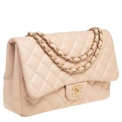 مملوكة مسبقًا حقيبة شانيل جامبو كلاسيك جلد مبطن بيج بقلاب واحد