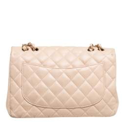 مملوكة مسبقًا حقيبة شانيل جامبو كلاسيك جلد مبطن بيج بقلاب واحد