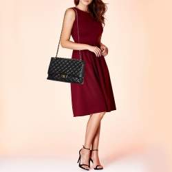 Pre Owned Chanel Black Quilted Caviar Leather Maxi Classic Single Flap Bag