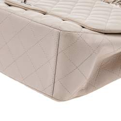 Pre Owned Chanel Beige Quilted Caviar Leather Maxi Classic Single Flap Bag