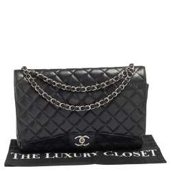 Pre Owned حقيبة شانيل ماكسي كلاسيك جلد كافيار أسود مبطن بقلاب مزدوج