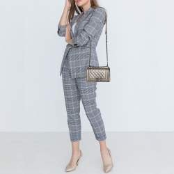 Pre Owned Chanel Metallic Beige Quilted Caviar Leather Small Boy Flap Bag