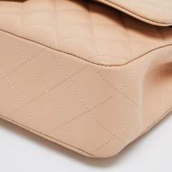 Pre Owned Chanel Beige Quilted Caviar Leather Medium Classic Double Flap Bag